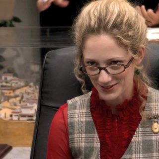 Kitty Sanchez as seen in the show, played by Judy Greer
