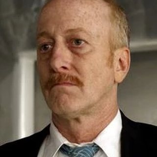 Captain Bill Daly as seen in the show, played by Frank Deal