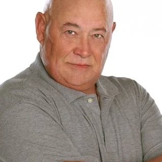 Coach Whitey Durham as seen in the show, played by Barry Corbin