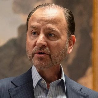 Hugo Baker as seen in the show, played by Fisher Stevens