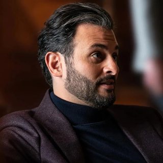 Stewy Hosseini as seen in the show, played by Arian Moayed