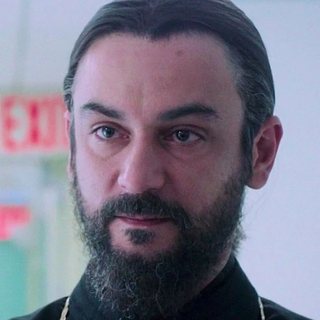 Father Andrei as seen in the show, played by Konstantin Lavysh