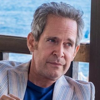 Quentin, played by Tom Hollander