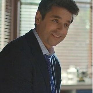 Dr Cameron Hayek as seen in the show, played by Mark Ghanime